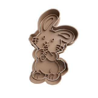 Conejo Comiendo Zanahoria De Pascua Cortante Para Galletitas