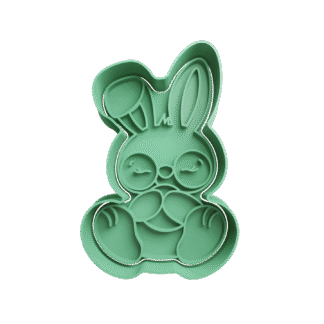 Conejo Sentado Con Huevo De Pascua Cortante Para Galletitas