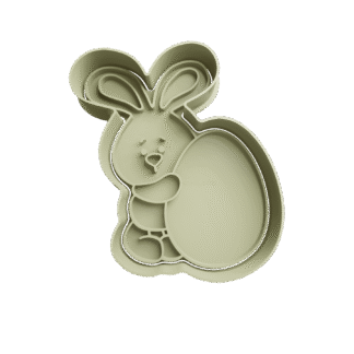 Conejo Sosteniendo Huevo De Pascua Cortante Para Galletitas